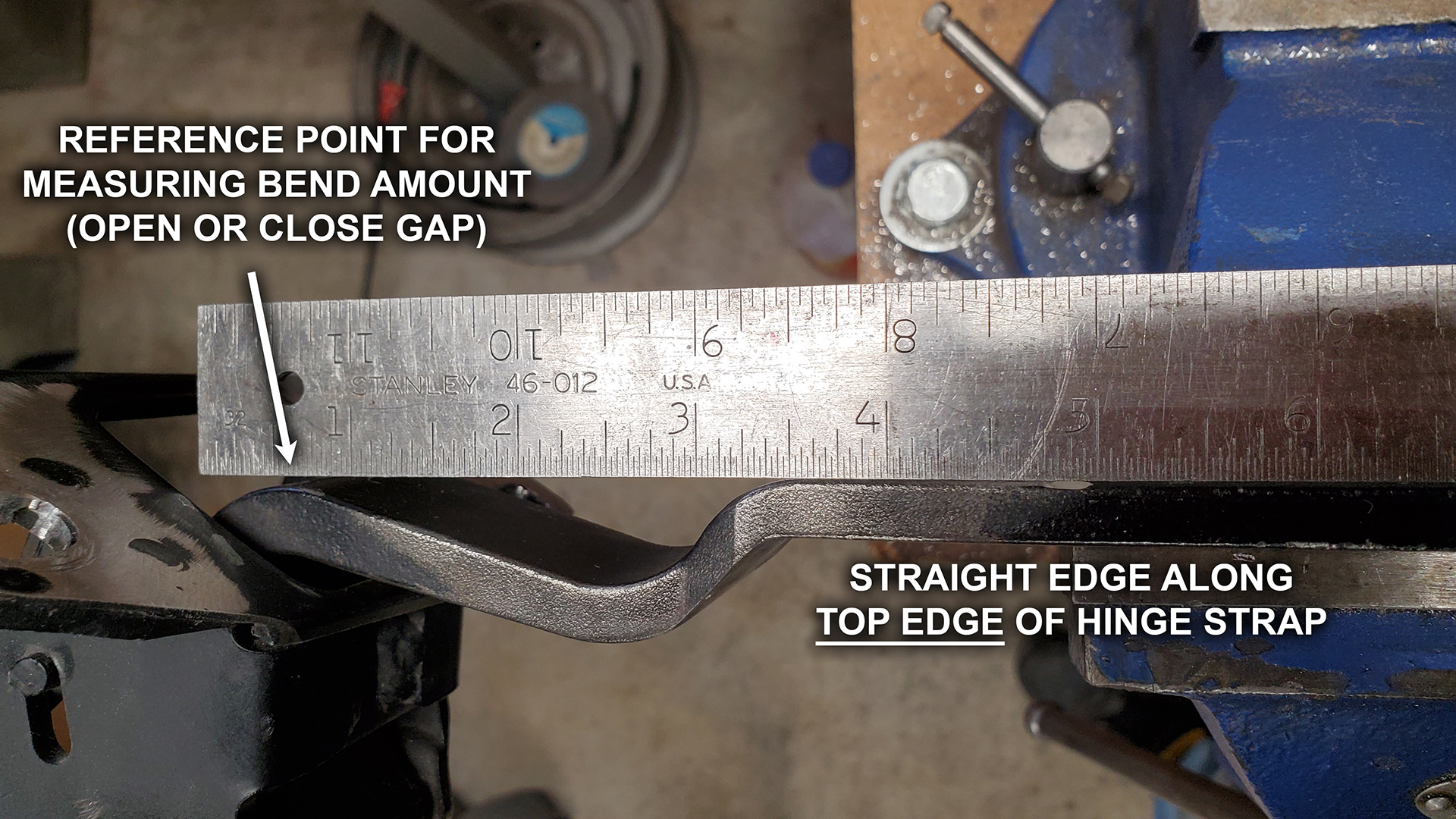 Use a straight edge along the upper edge of the strap as a reference to measure bend amount.