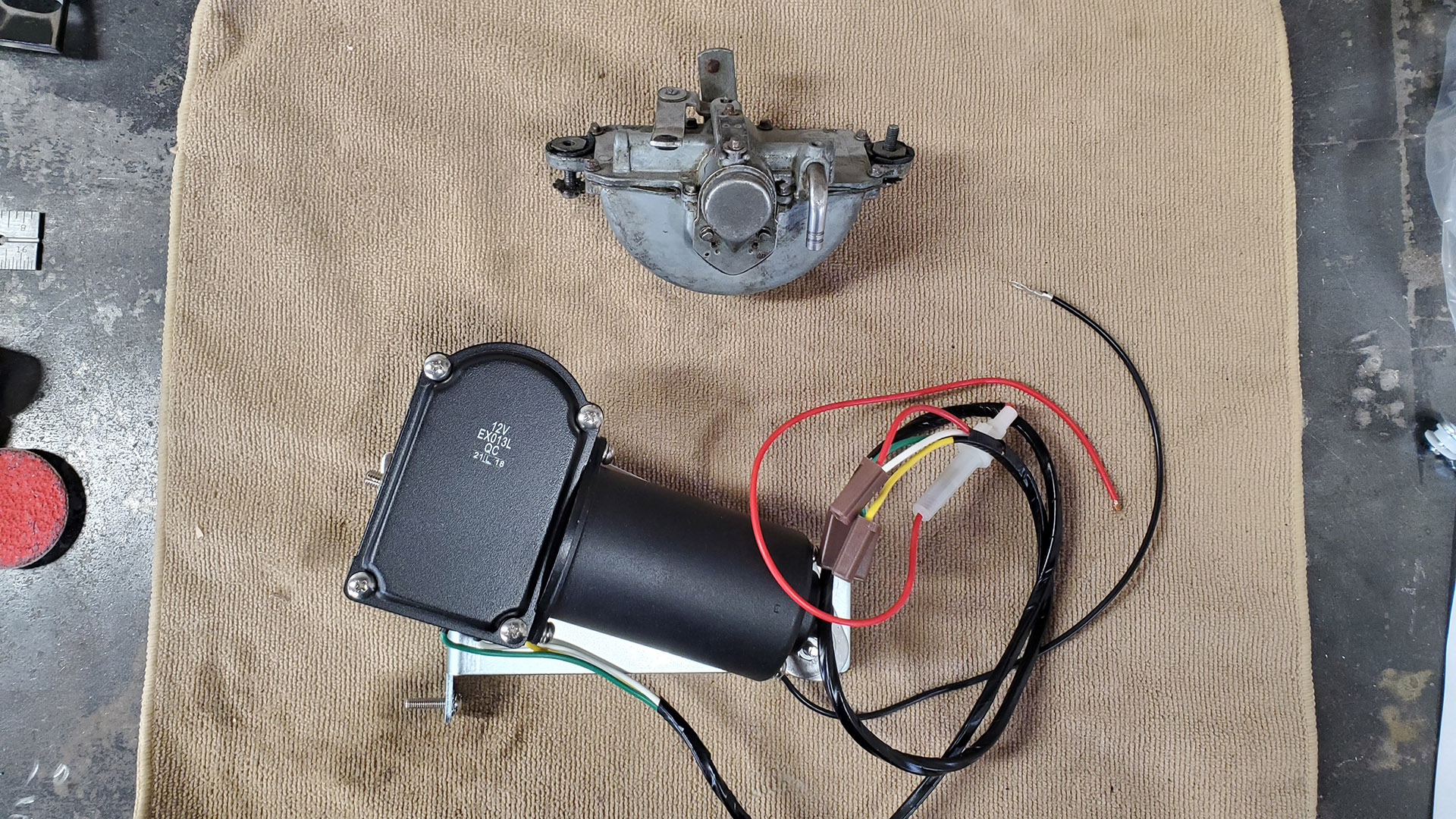 Original vacuum motor (top) and electric converion motor (bottom)