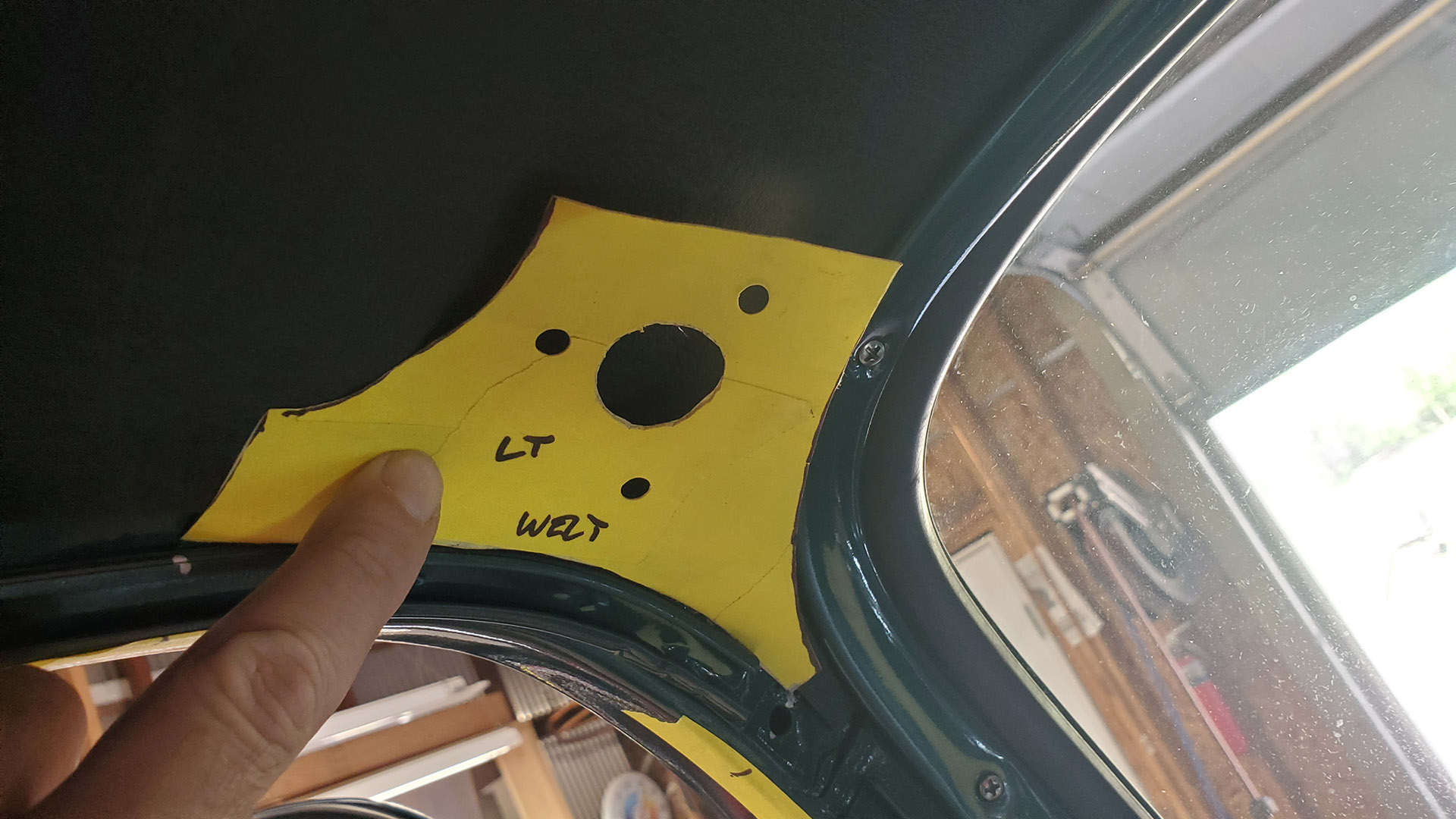 Template to quickly locate sun visor mounting holes