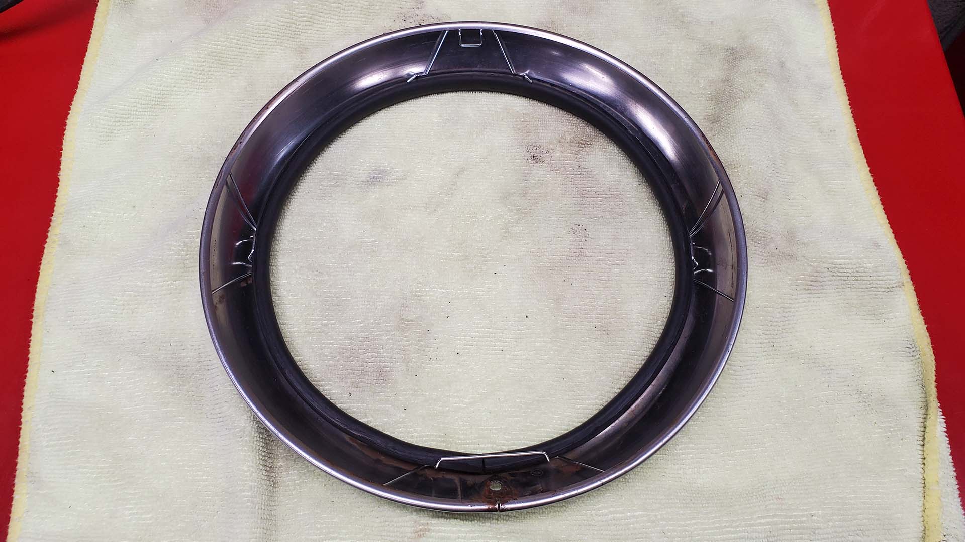 Headlight trim ring, seal, and fiddly retainers